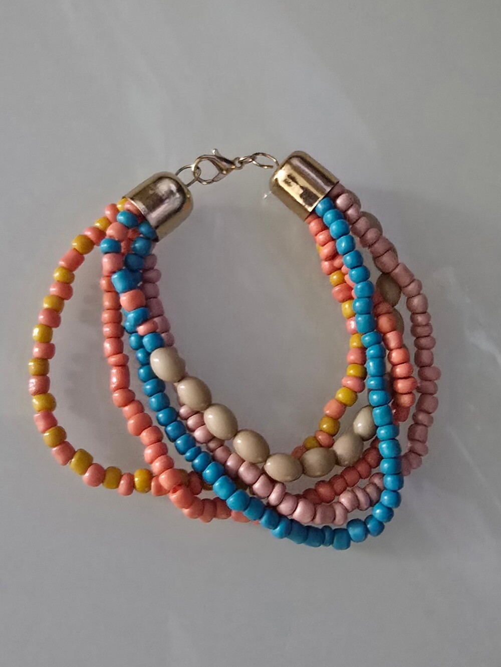 Multistrand Beaded Bracelet in Pink, Blue, Peach and Yellow